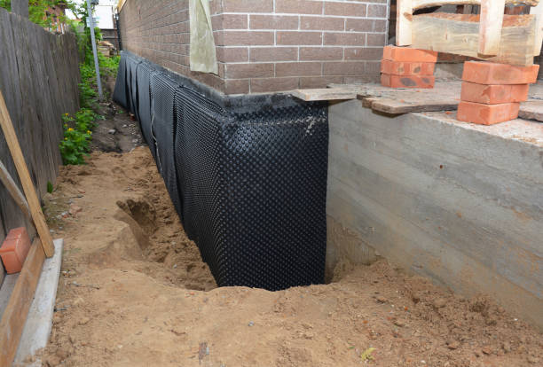 SJ Waterproofing Pros technician performing targeted Interior Drainage System assessment in Welcome, MD